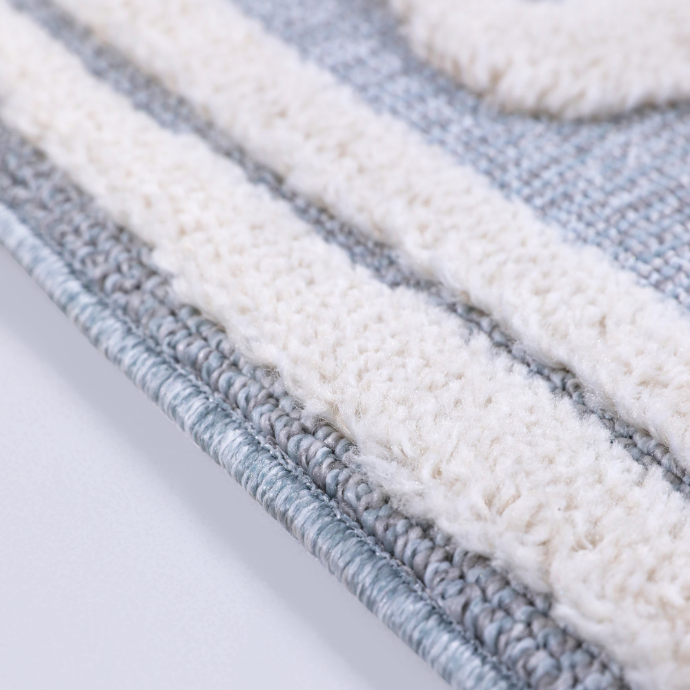 Close-up of Veiled Dreams Kids Woven Rug with soft texture and pastel colors for playrooms.