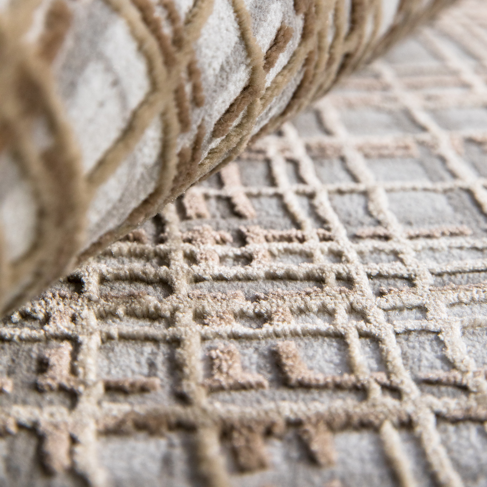 Theo Checkered Textured Rug with geometric pattern in soft beige and gray hues.