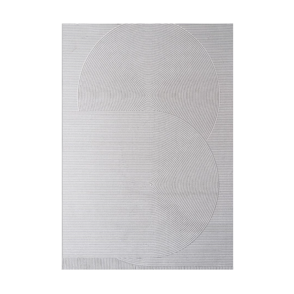 Modern textured rug with concentric circle pattern in gray