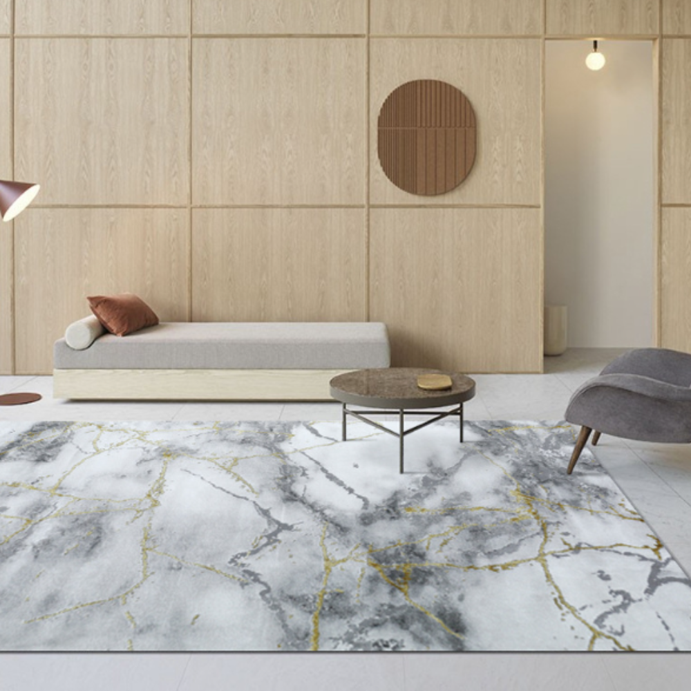 Abstract textured rug in gray and gold in modern living room